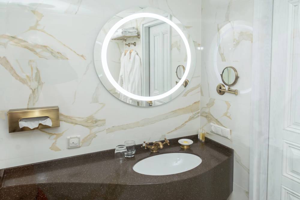 How To Hang A Bathroom Mirror Without The Hassle