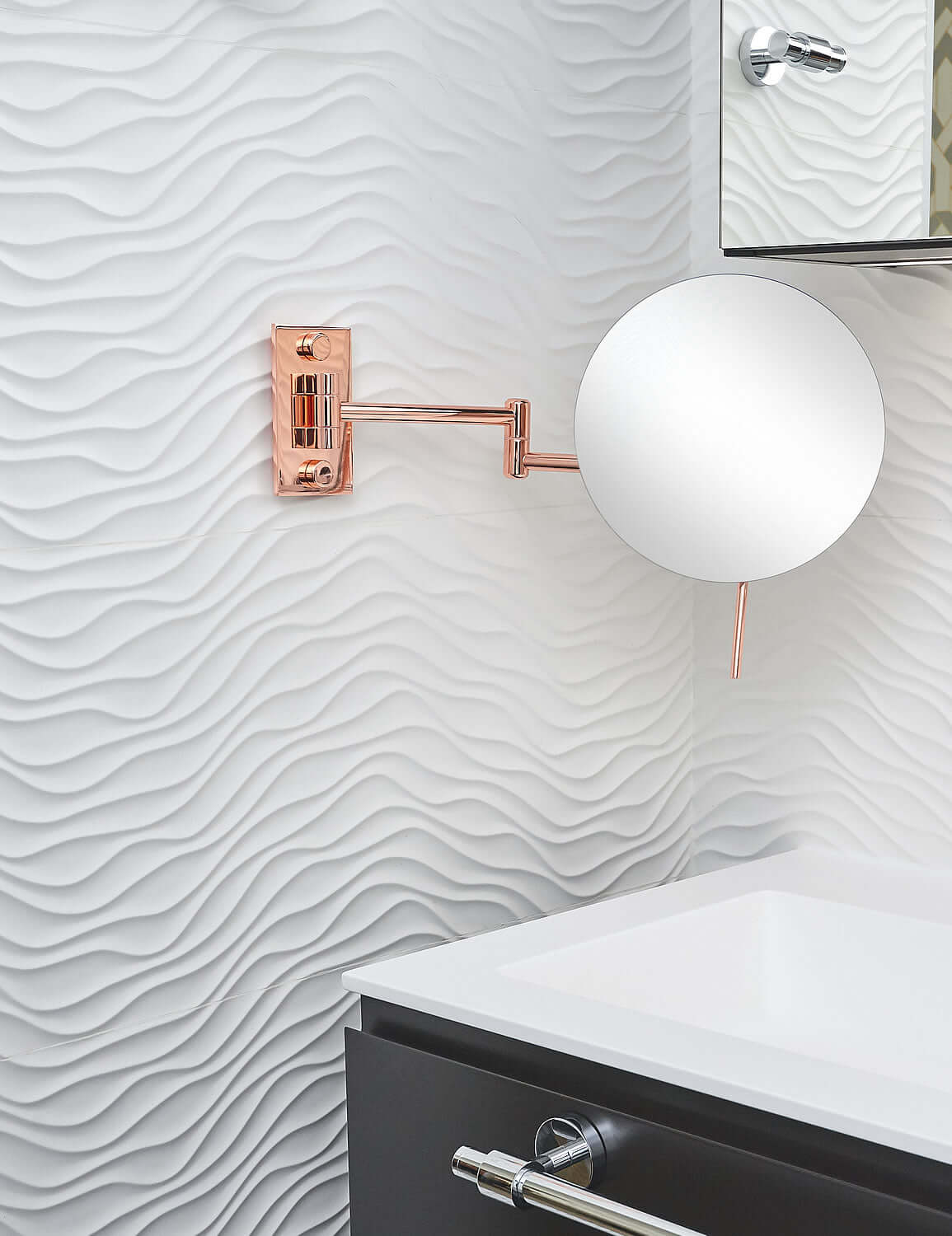 The Epure by Miroir Brot extends out to 15.4", while the head swievls in every direction. Beautiful!