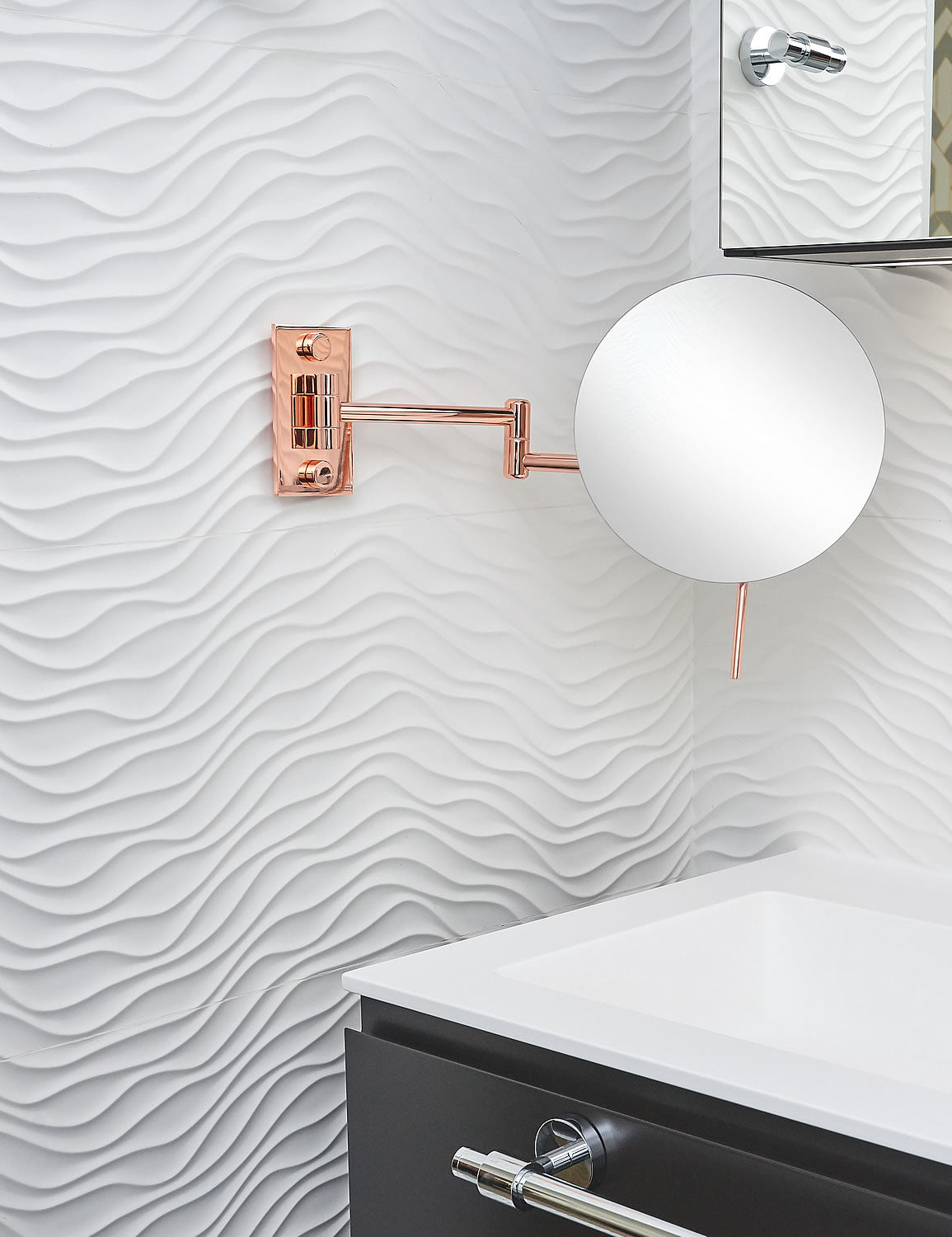 The Epure by Miroir Brot extends out to 15.4", while the head swievls in every direction. Beautiful!