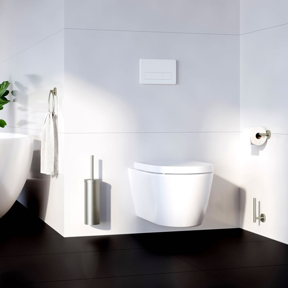 In the Photo: Brushed Nickel Toilet Brush Set, Towel Ring, Toilet Paper Holder and Spare Roll Holder, all in the Smedbo Home Collection