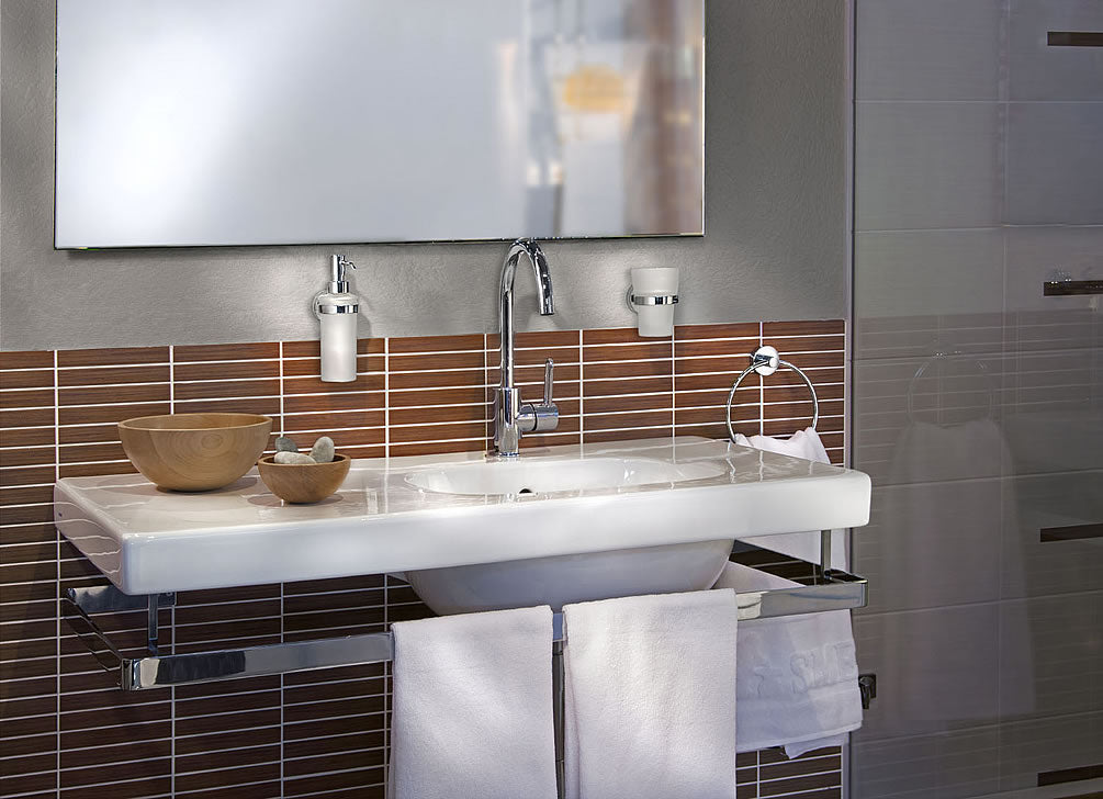 Soap - Lotion Dispenser and Tumbler, both in Polished Chrome. The Smedbo Home Collection.