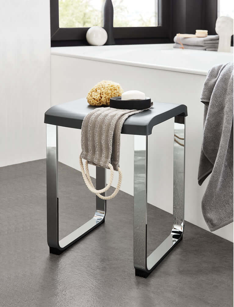 Weighing in at 12.1 lbs, the Smedbo Shower Seat holds up to 330 lbs.