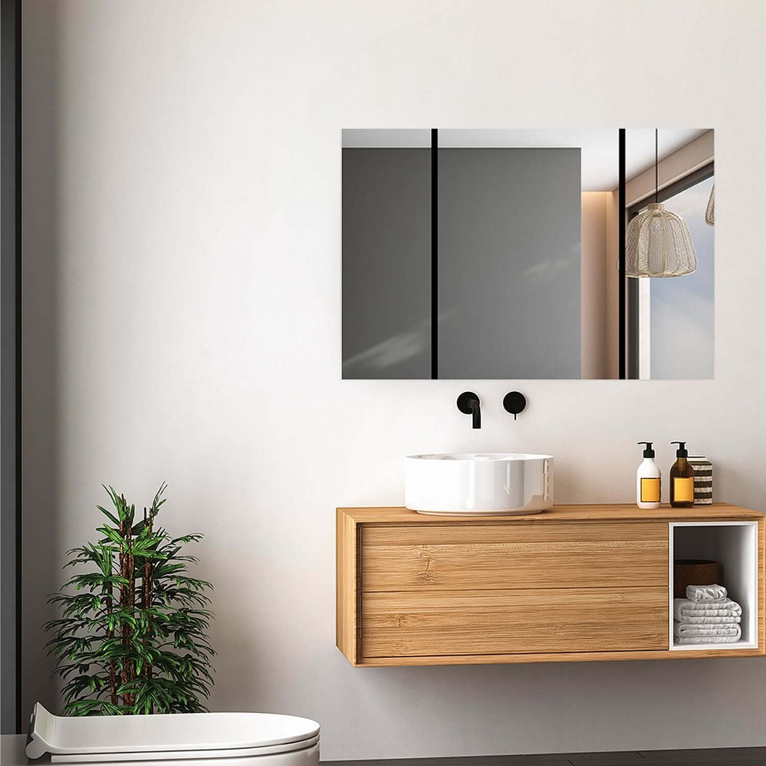 Aquadom Royale 3-Door Medicine Cabinet in a modern bathroom setting showcasing sleek design and features.