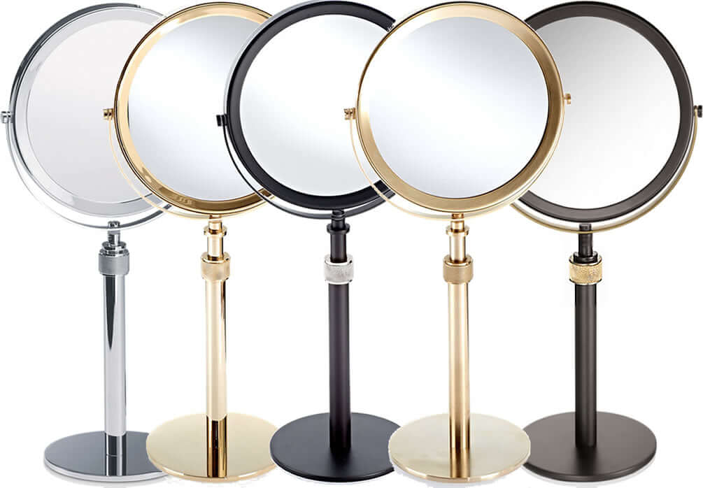 Decor Walther adjustable height 5x/1x Makeup Mirror. Left-to-right: Polished Chrome, Polished 24 Carat Gold, Matte Black, Matte 24 Carat Gold, Dark Metal (Brown/Black)