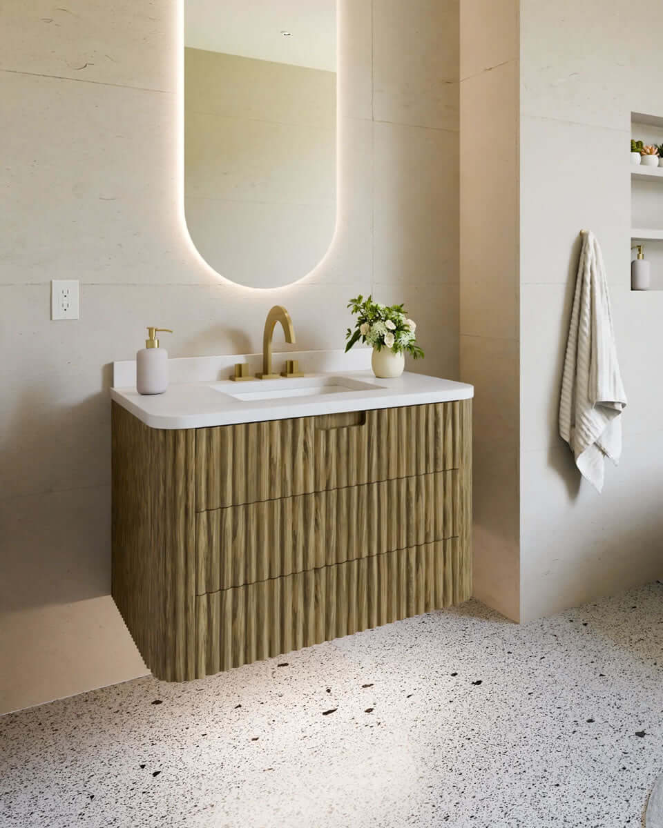 Sabre Oak Monterey Vanity by Electric Mirror, with Cararra Quartz top with sink.