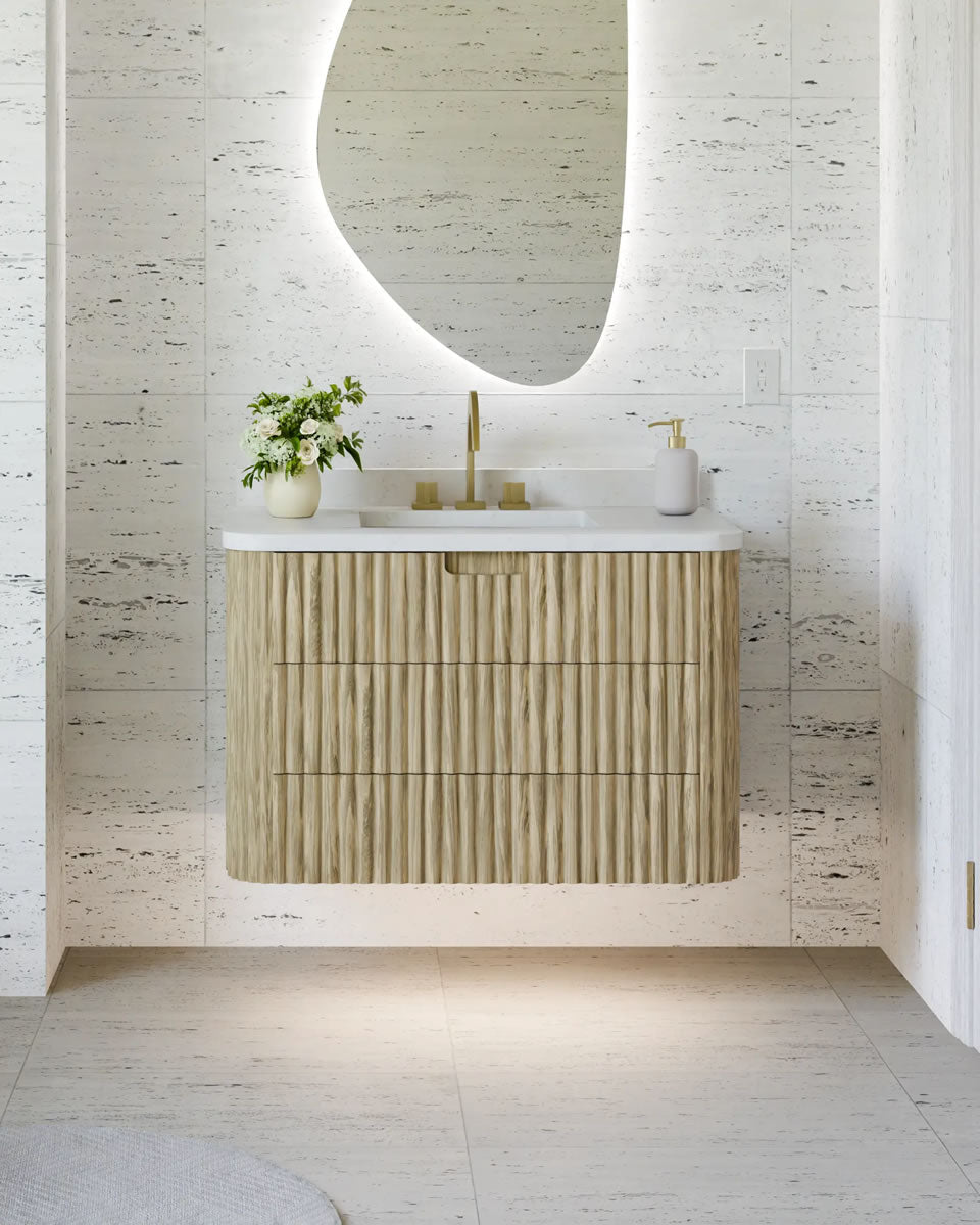 Monterey Floating Vanity by Electric Mirror in Luxe Oak. Electric Mirror's Vela Vanity Mirror shown above the vanity.