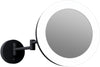 Trending matte black in a hardwired makeup mirror that's 5x/1x reversible."Glamour" by the Electric Mirror company.