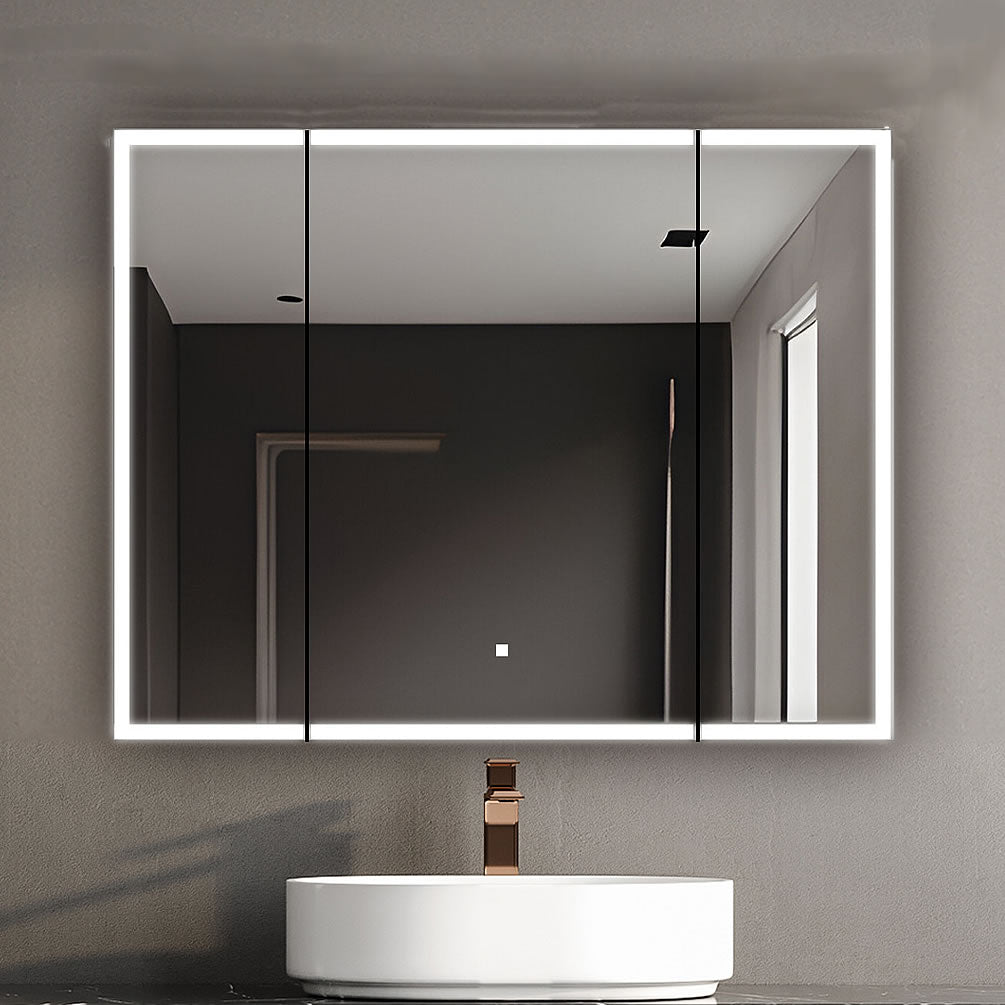 The 3 doors are mirrored inside and out, as is the back-wall, on the Edge Royal 40" Wide Medicine Cabinet by Aquadom.