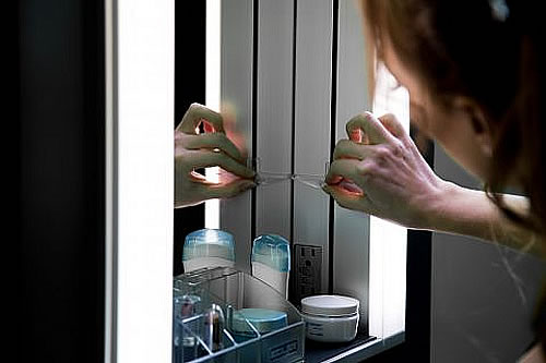 Sidler Sidelight 23" Wide LED Medicine Cabinet opens Vertically