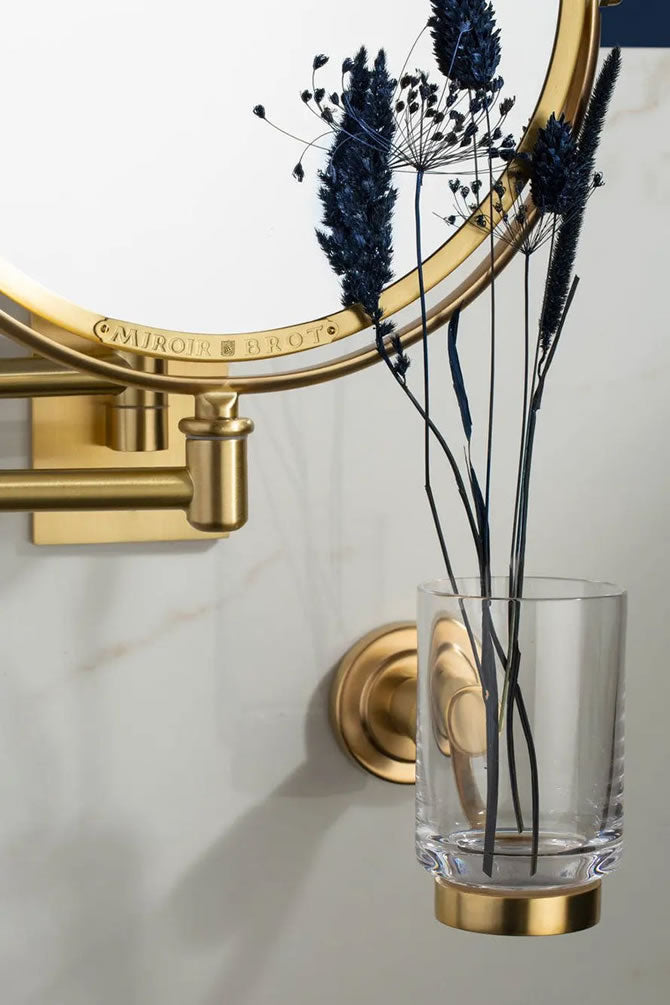 Custom made in 28 finishes by Miroir Brot of France.